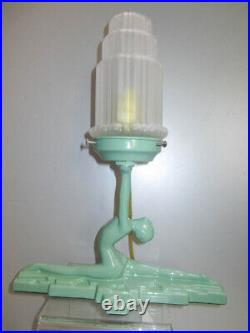 Frankart style NuArt art deco nymph lamp doing a split green metal and glass USA