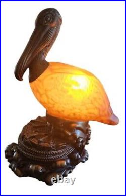 Pelican Decorative Table Lamp Metal Amber Glass 10 H x 9 W