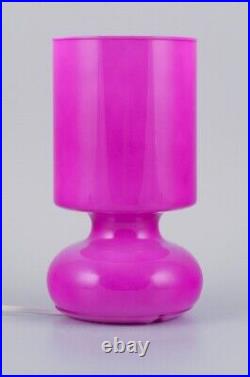Scandinavian designer, table lamp in pink glass. Late 1900s
